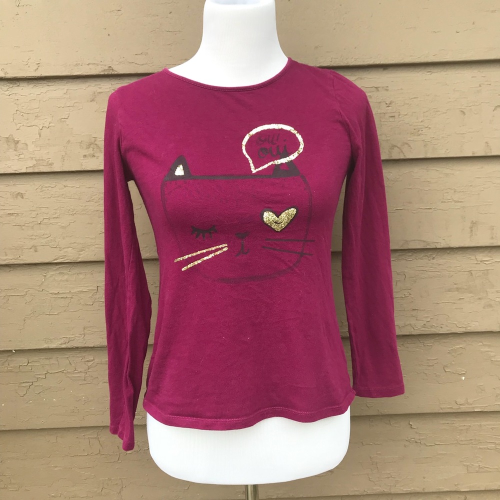 A long sleeve gold glitter dark color cat shirt